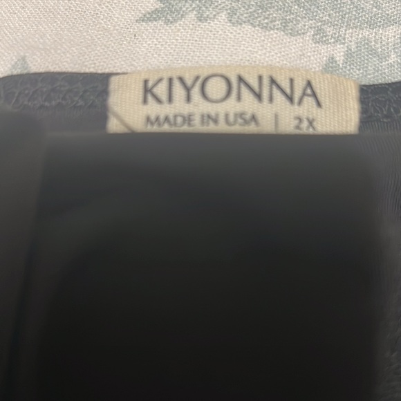 Lovely Kiyonna wrap dress with ruffles in black.  Like new and worn only once. - Picture 2 of 2